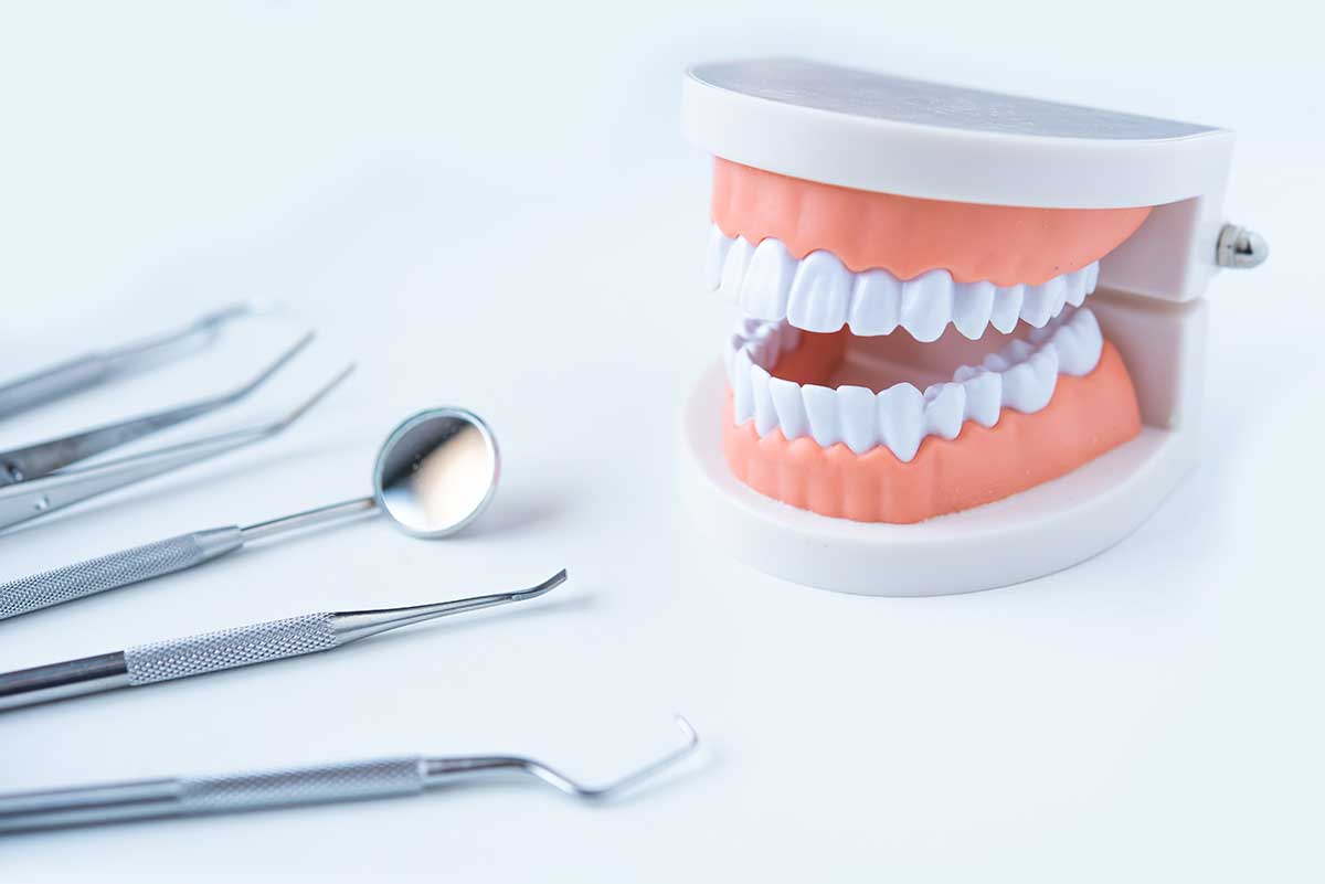 Can I remove plaque from my teeth at home? - Martindale Dental