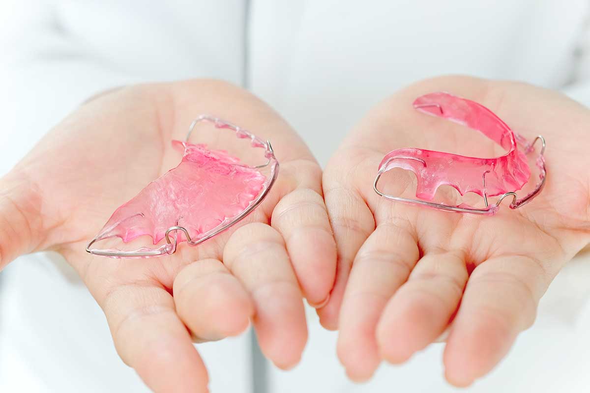 image showing a top and bottom retainer made out of pink acrylic