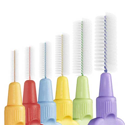 image showing a row of different sized interdental brushes used to clean braces