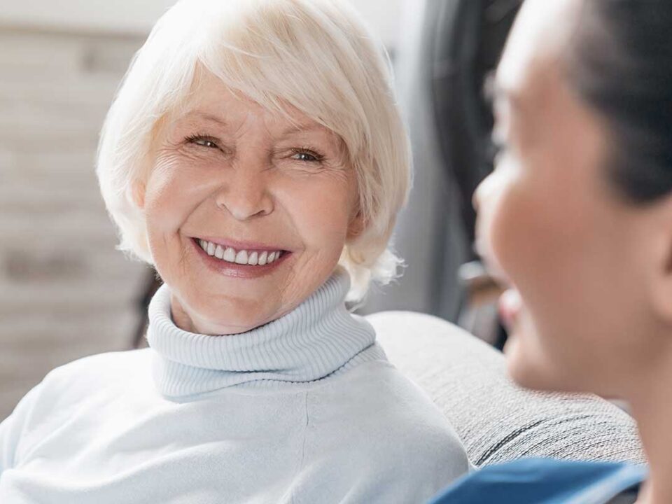 elderly woman at the dentist taking care of her oral health