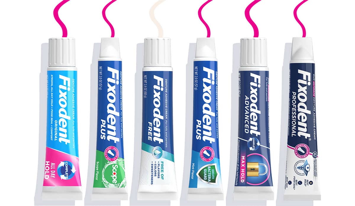 a lineup of fixodent denture adhesive tubes that can be used to secure dentures for the wearer
