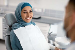 newcomer to canada is having her first dental visit at our hamilton dentist