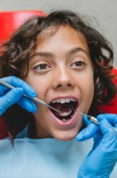 young boy visiting the family dentist in hamilton