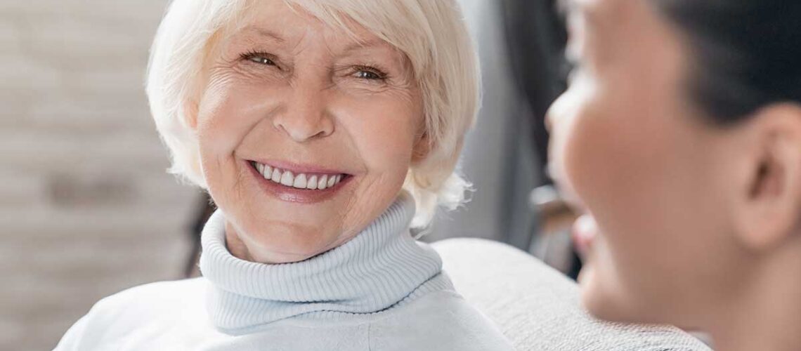 elderly woman at the dentist taking care of her oral health